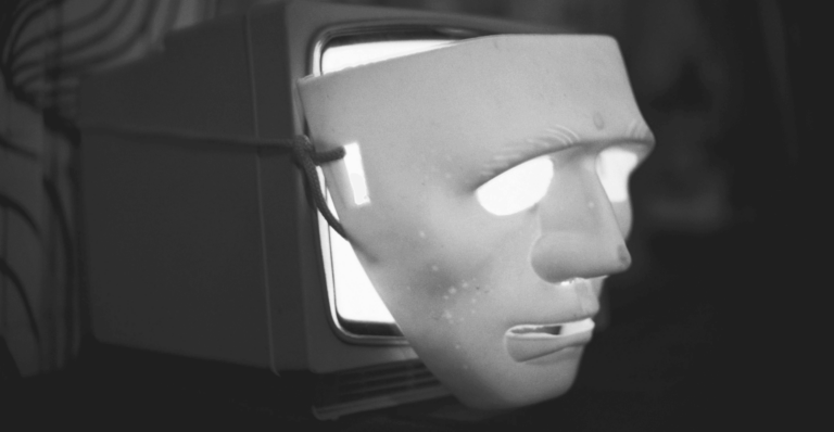 This image of a mask covering a computer illustrates our discussion topic: Rogue websites, the threats against businesses in the US and beyond, and solutions for fighting back.